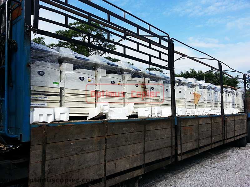 Optimus Copier's Lorry loaded with multiple new photocopiers wrapped in plastic ready for delivery, for copier rental services and copier for sale across Malaysia especially KL, Melaka and Negeri Sembilan